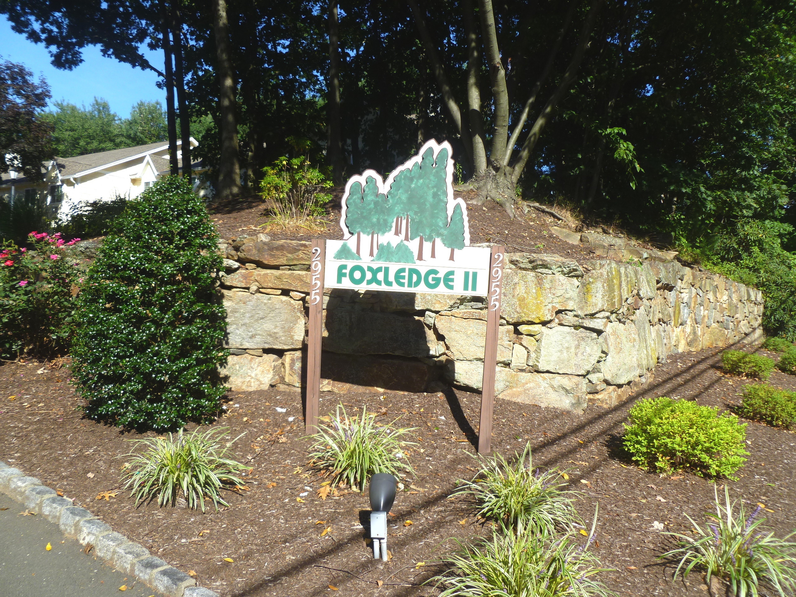 2955 Madison Avenue, Unit 46 Bridgeport, CT 06606 - Photo 29 of 29 a view of a water fountain and an outdoor seating