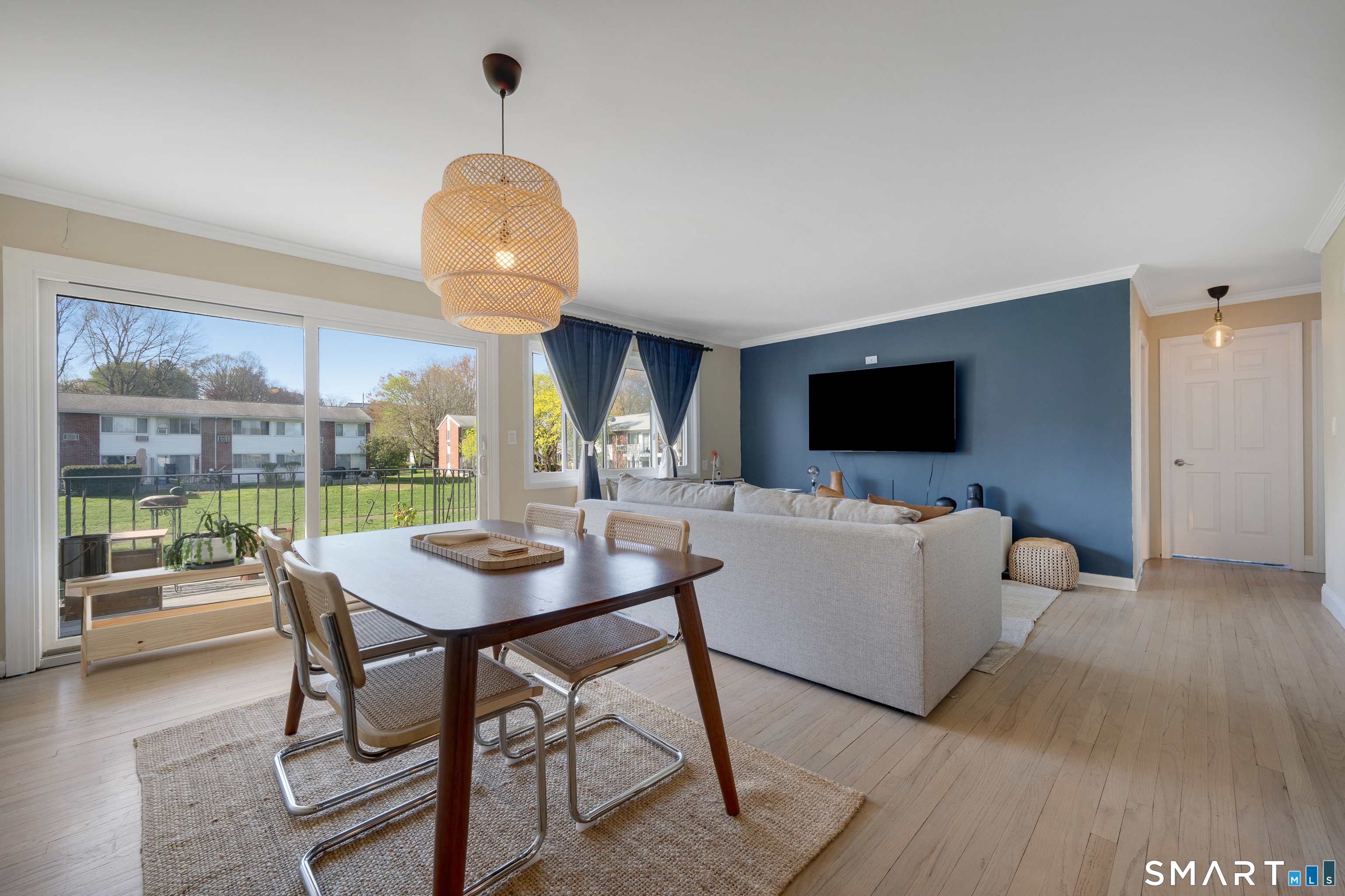 80 County Street, Unit 10F Norwalk, CT 06851 - Photo 12 of 29 a living room with furniture and a flat screen tv