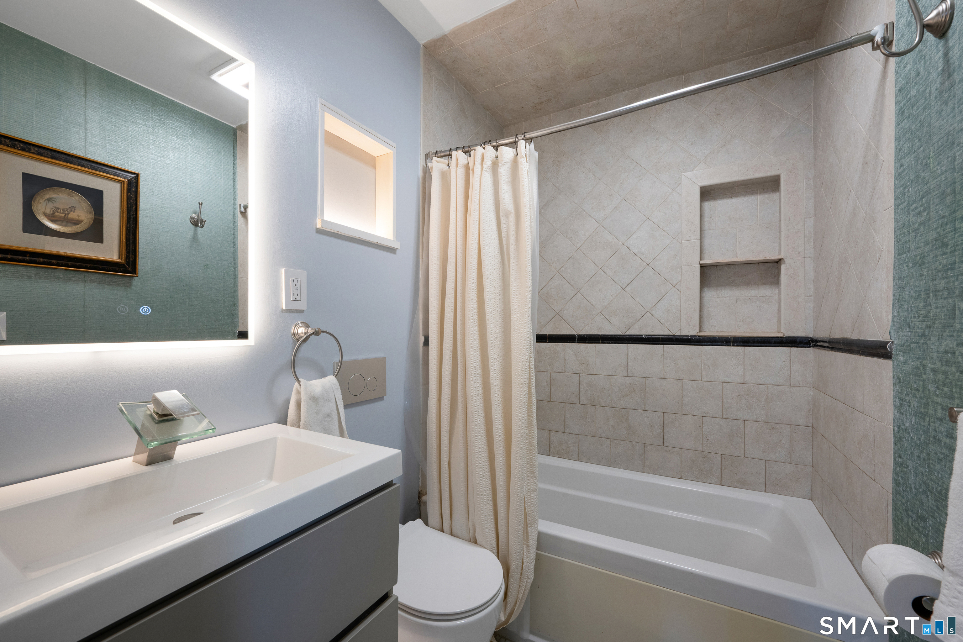 80 County Street, Unit 10F Norwalk, CT 06851 - Photo 18 of 29 a bathroom with a sink toilet and shower