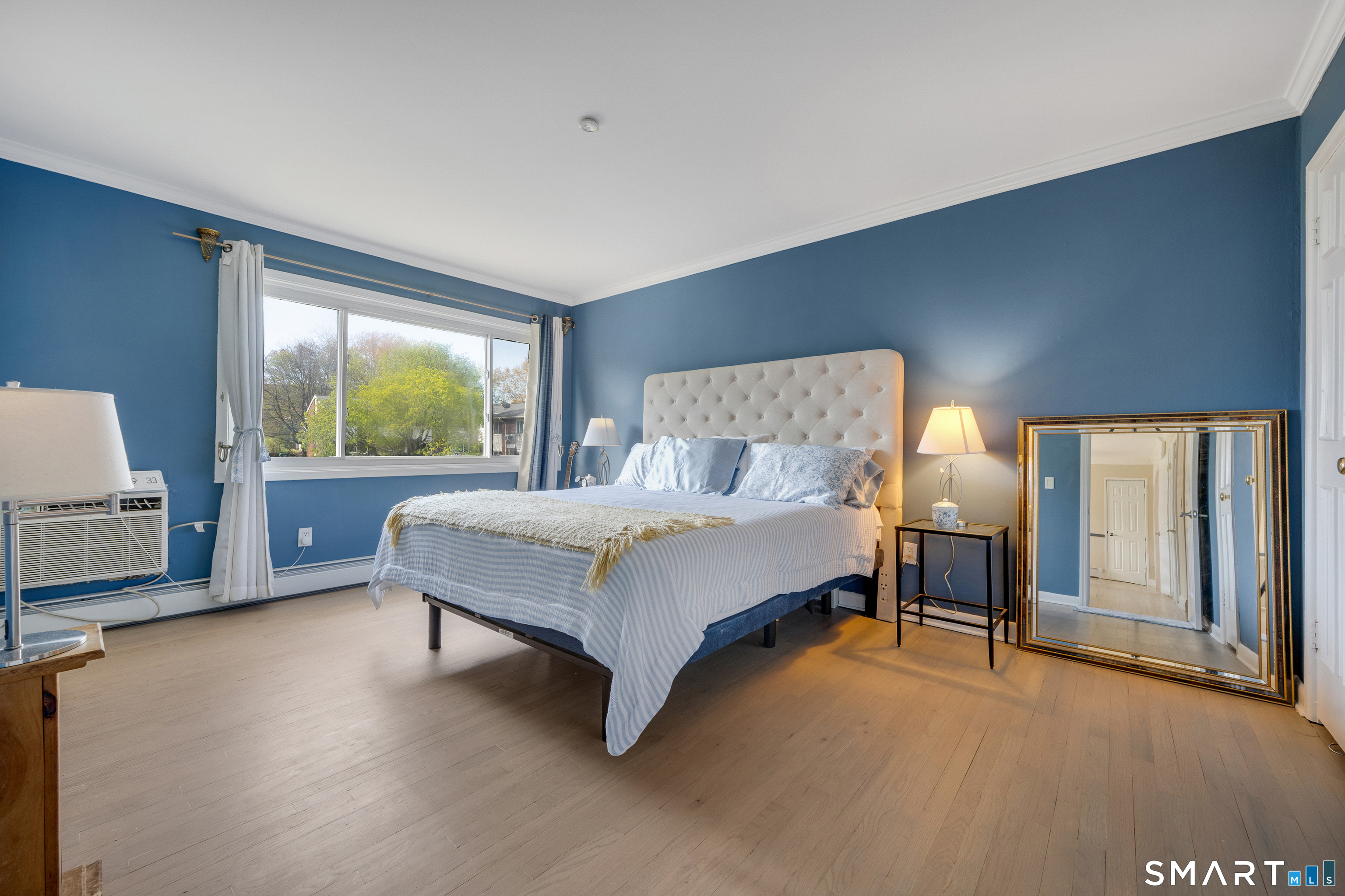 80 County Street, Unit 10F Norwalk, CT 06851 - Photo 20 of 29 a bedroom with a bed chair and window