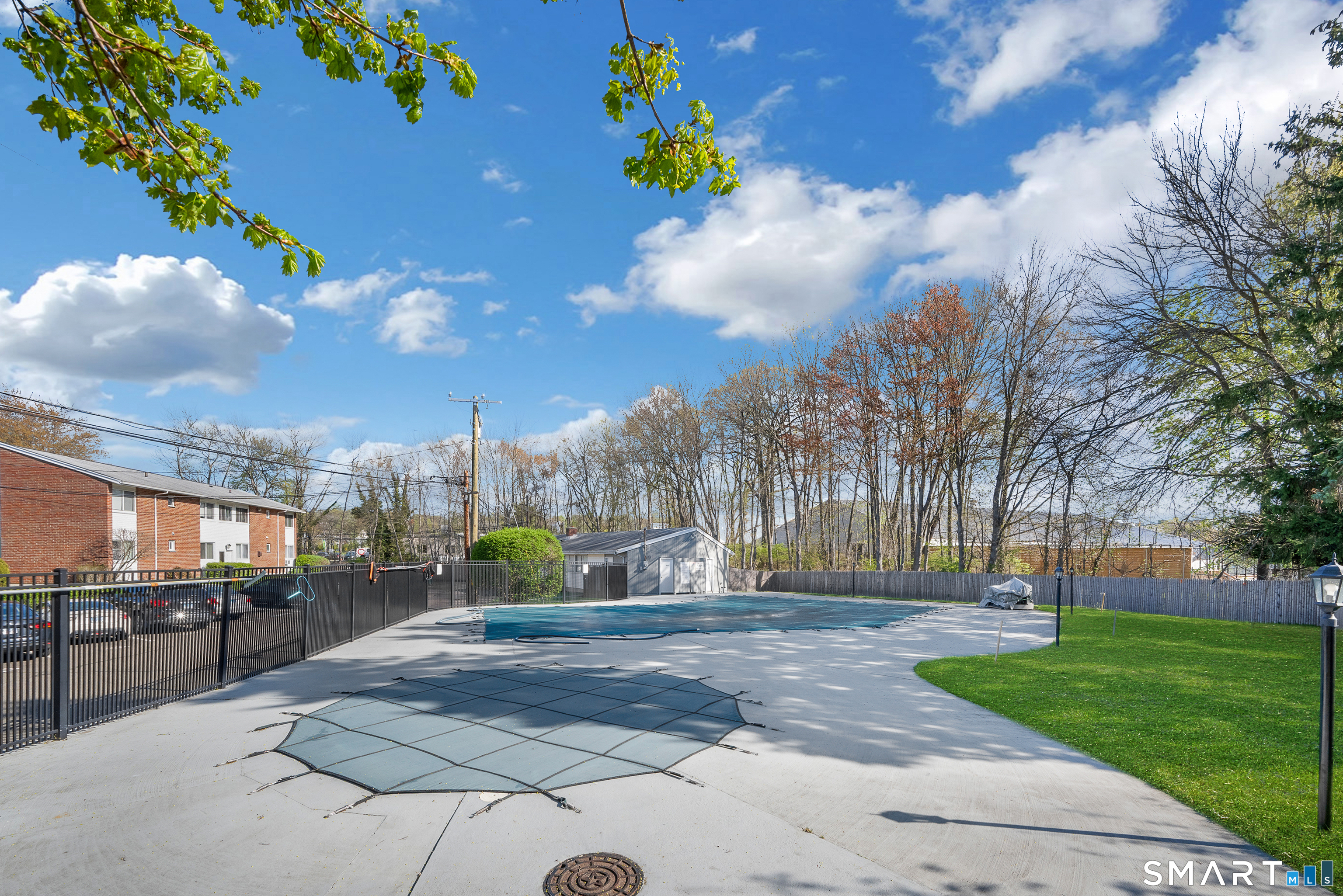 80 County Street, Unit 10F Norwalk, CT 06851 - Photo 3 of 29 a view of a pathway with a yard