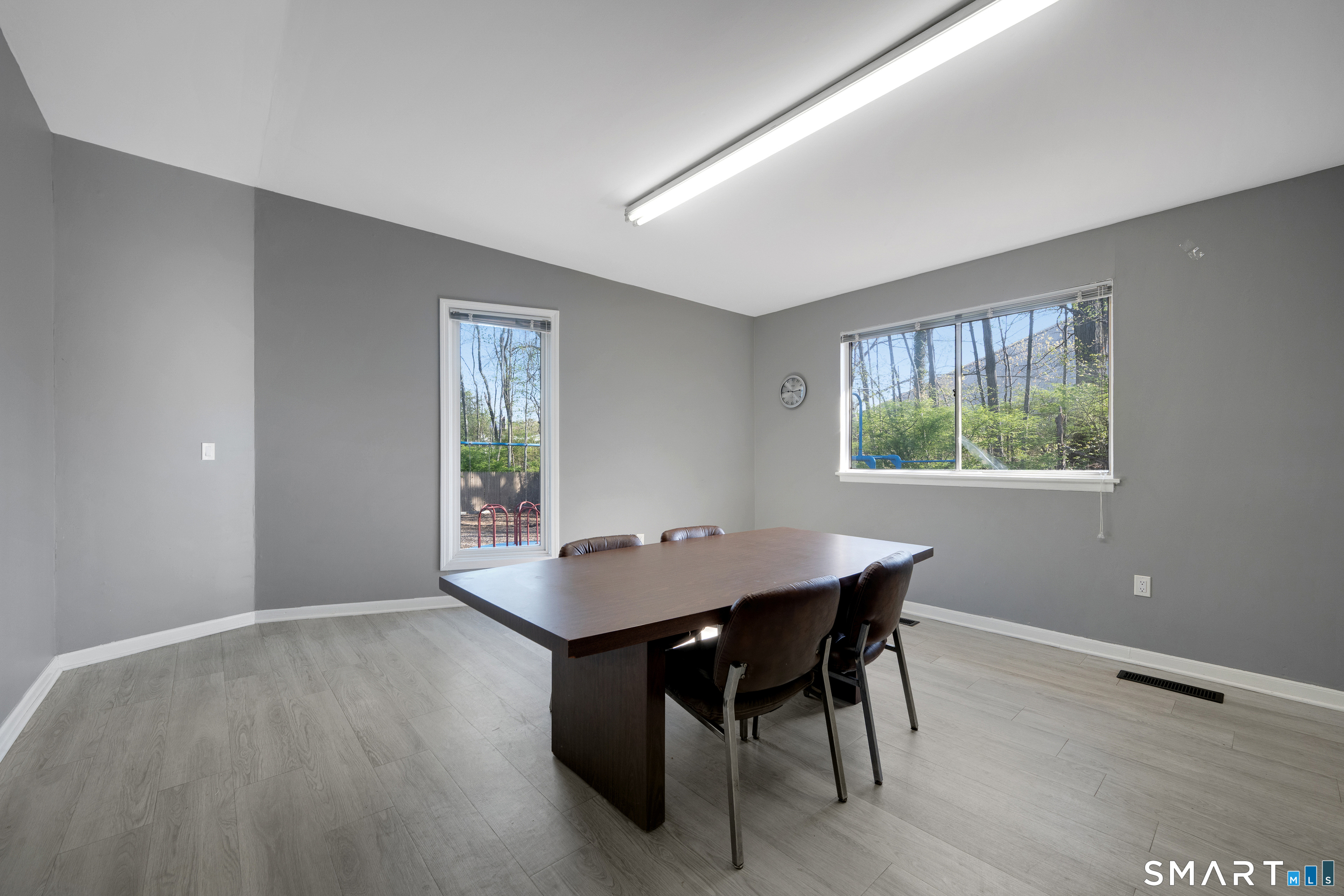 80 County Street, Unit 10F Norwalk, CT 06851 - Photo 5 of 29 a view of a dining room with furniture window and outside view