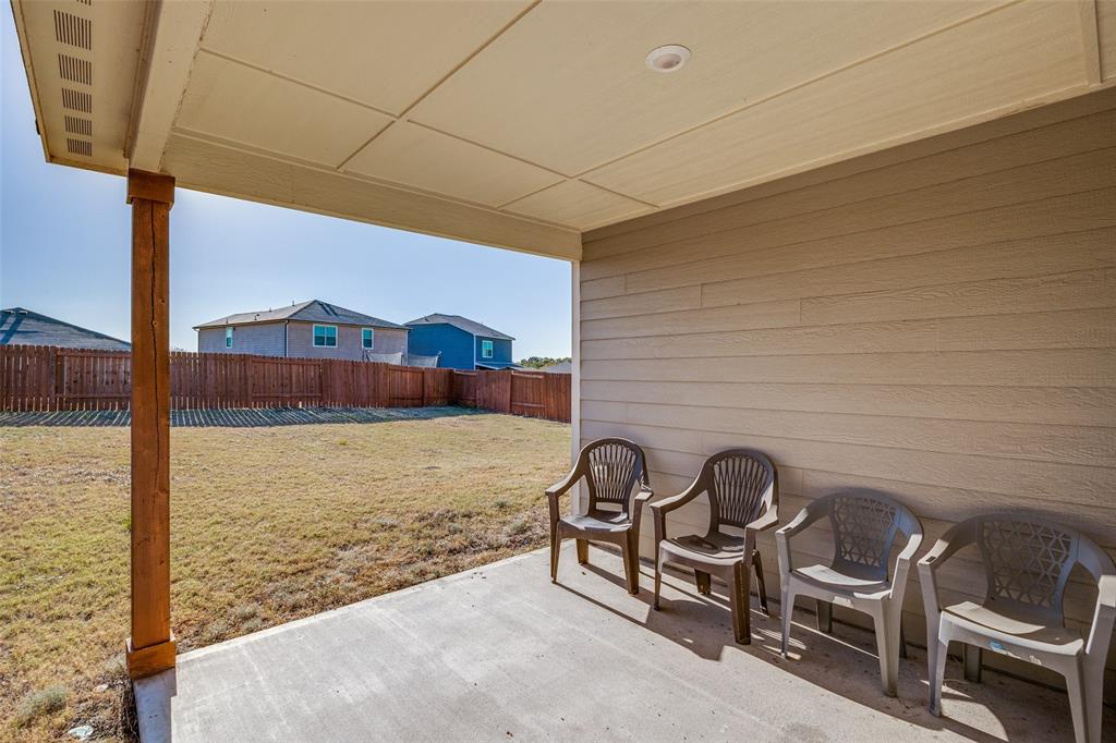 14240 Chaps Drive Dallas, TX 75253 - Photo 19 of 25 a view of a chairs and table in the balcony
