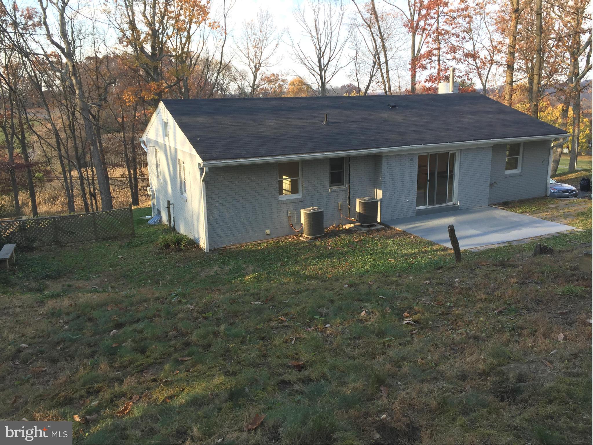 23813 Stringtown Road Clarksburg, MD 20871 - Photo 12 of 12 a front view of a house with garage