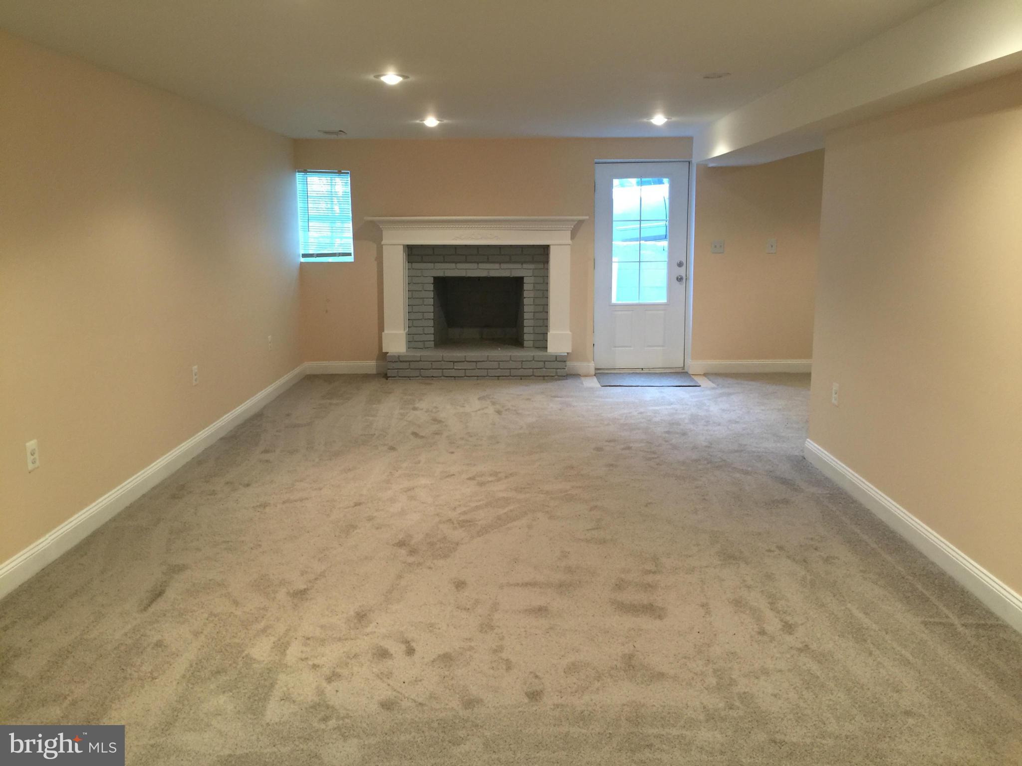23813 Stringtown Road Clarksburg, MD 20871 - Photo 9 of 12 an empty room with windows