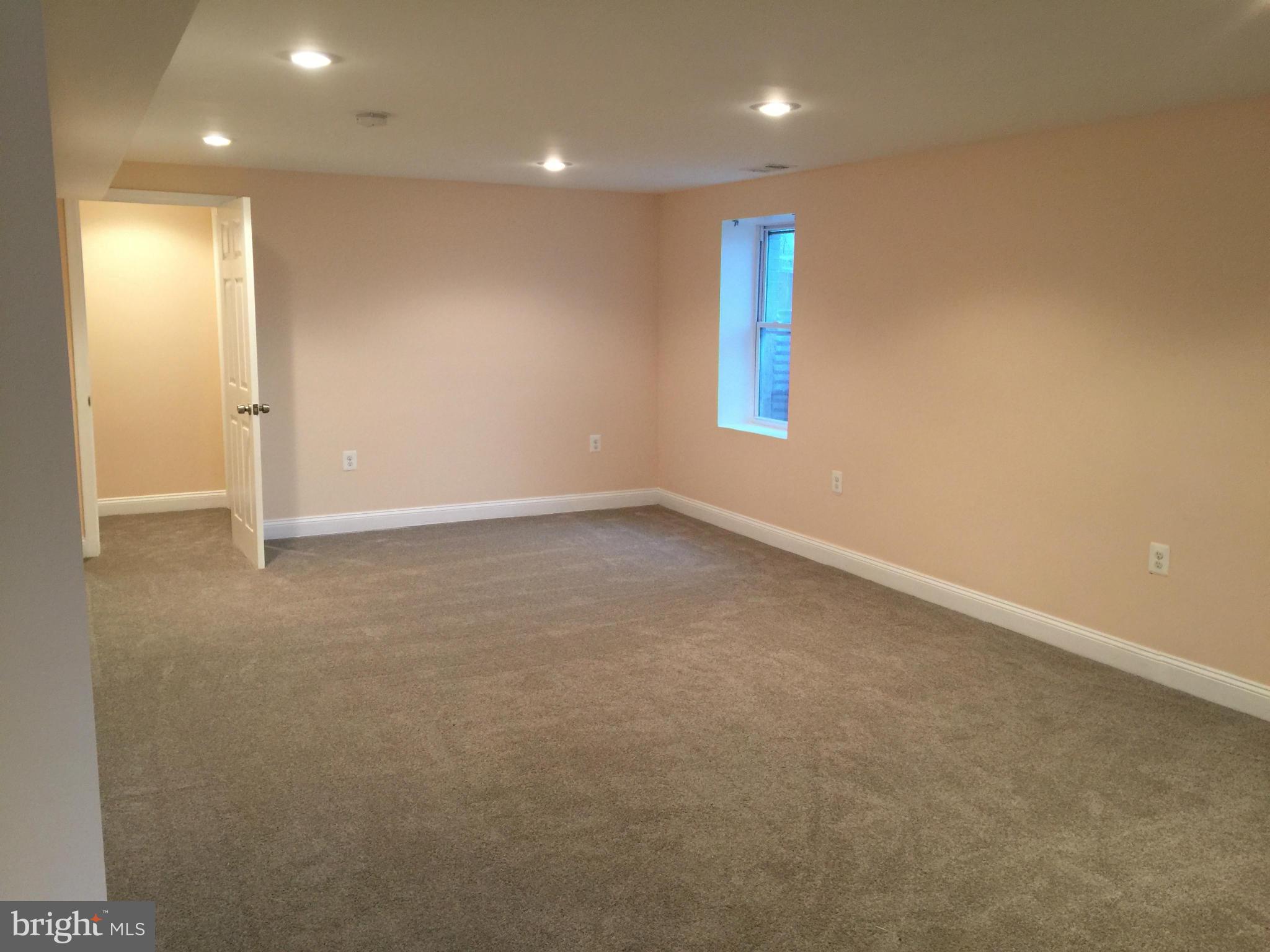 23813 Stringtown Road Clarksburg, MD 20871 - Photo 10 of 12 an empty room with windows and closet