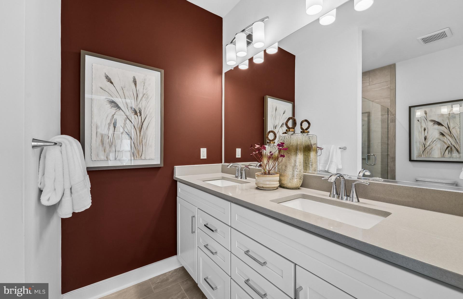 710 Shellbark Lane Laurel, MD 20724 - Photo 16 of 61 a bathroom with a sink and a mirror