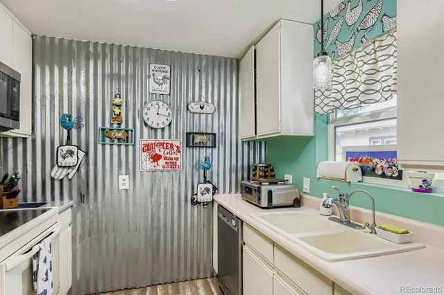 a bathroom with a sink vanity and a mirror