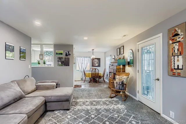 a living room with furniture and a couch