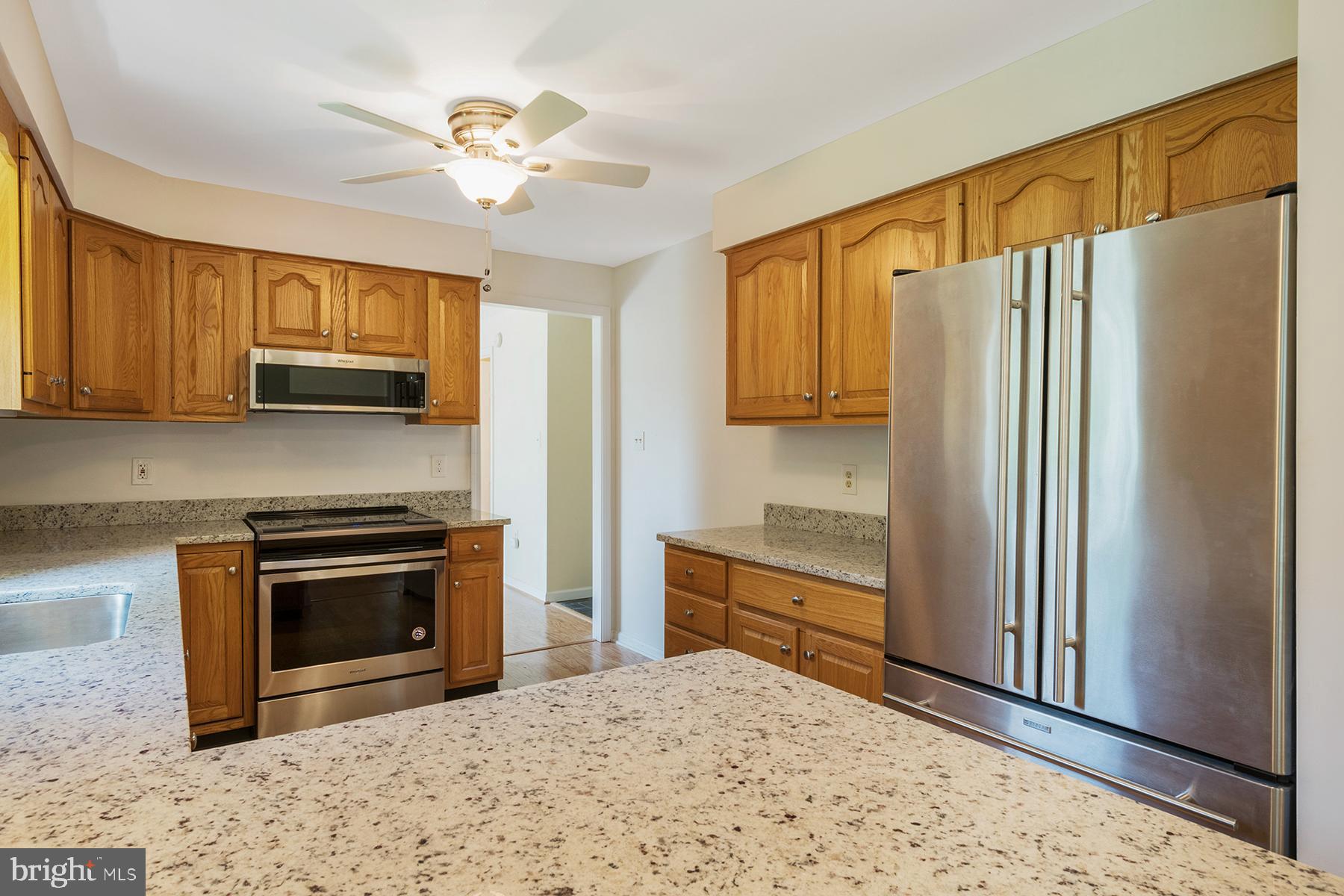 1190 Cavalier Road Arnold, MD 21012 - Photo 10 of 37 Remodeled kitchen has granite counters