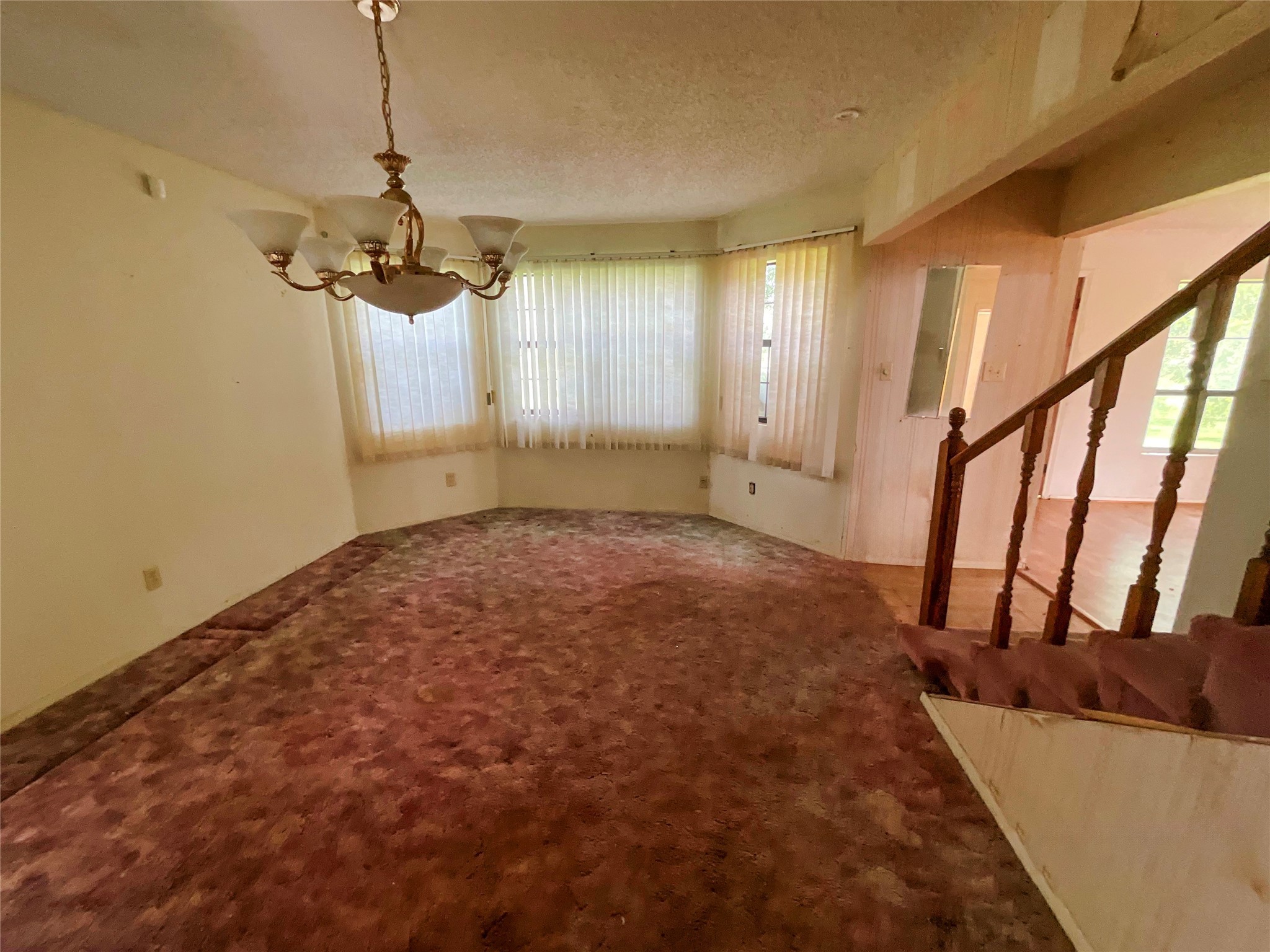 1571 FM 640 Road Wharton, TX 77488 - Photo 14 of 15 a view of a room with a window and a chandelier