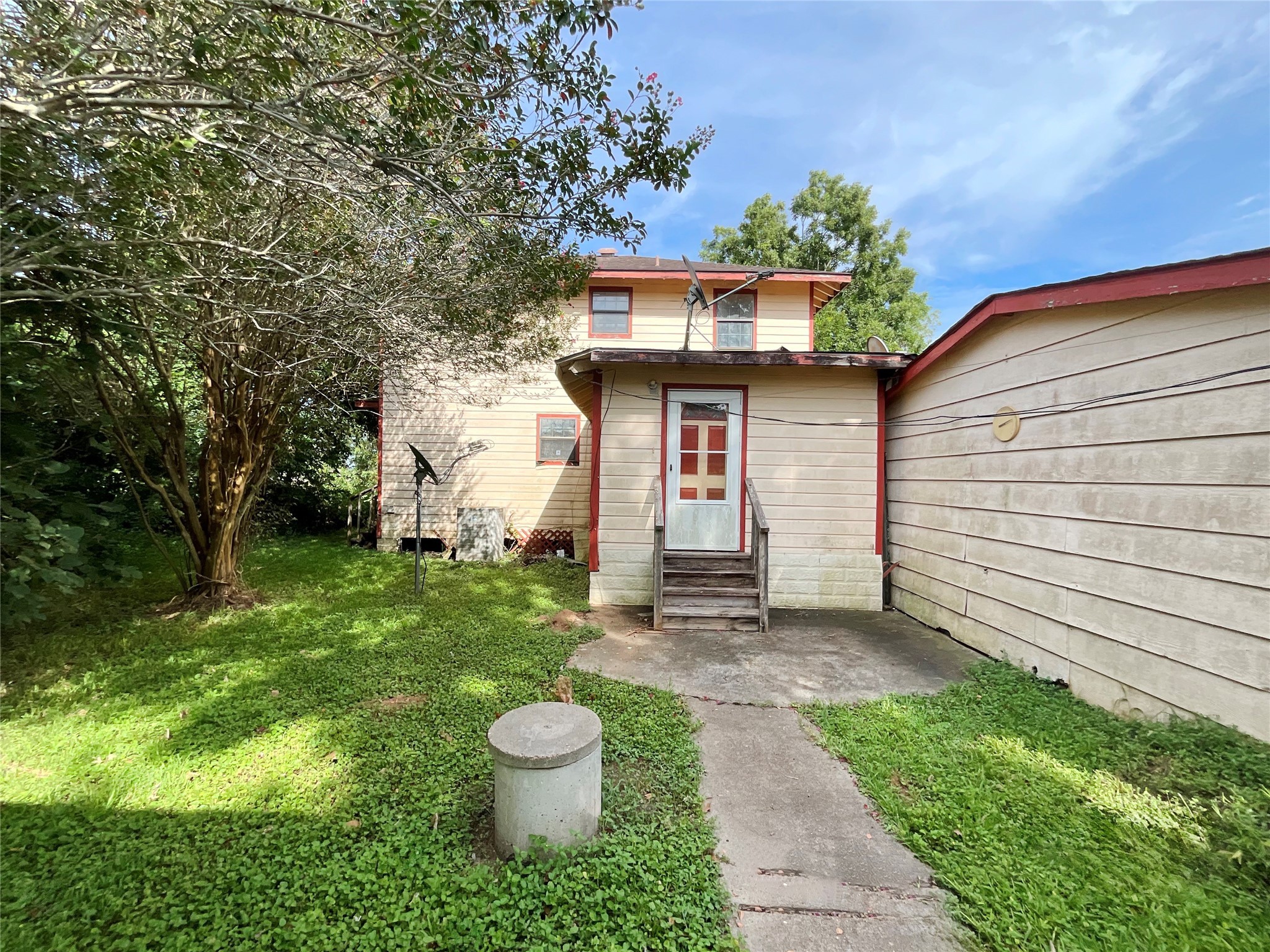 1571 FM 640 Road Wharton, TX 77488 - Photo 5 of 15 a view of a back yard of the house