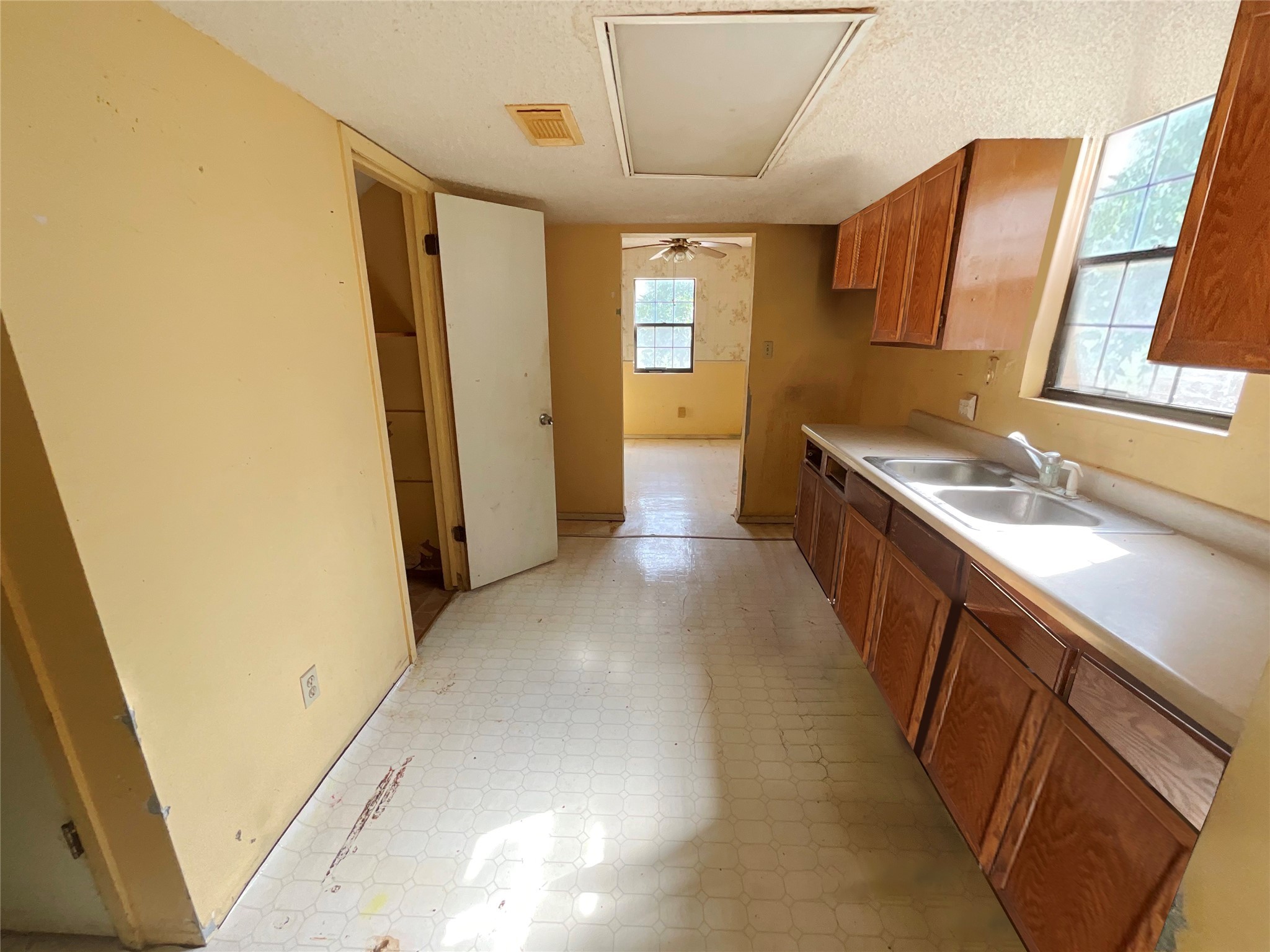 1571 FM 640 Road Wharton, TX 77488 - Photo 7 of 15 a bathroom with a sink a mirror and a toilet