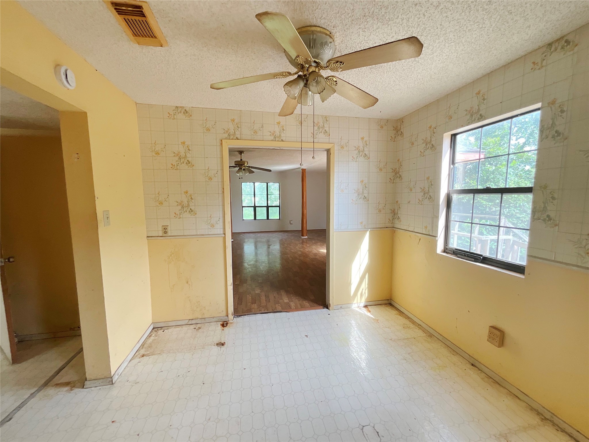 1571 FM 640 Road Wharton, TX 77488 - Photo 8 of 15 wooden floor in an empty room with a window