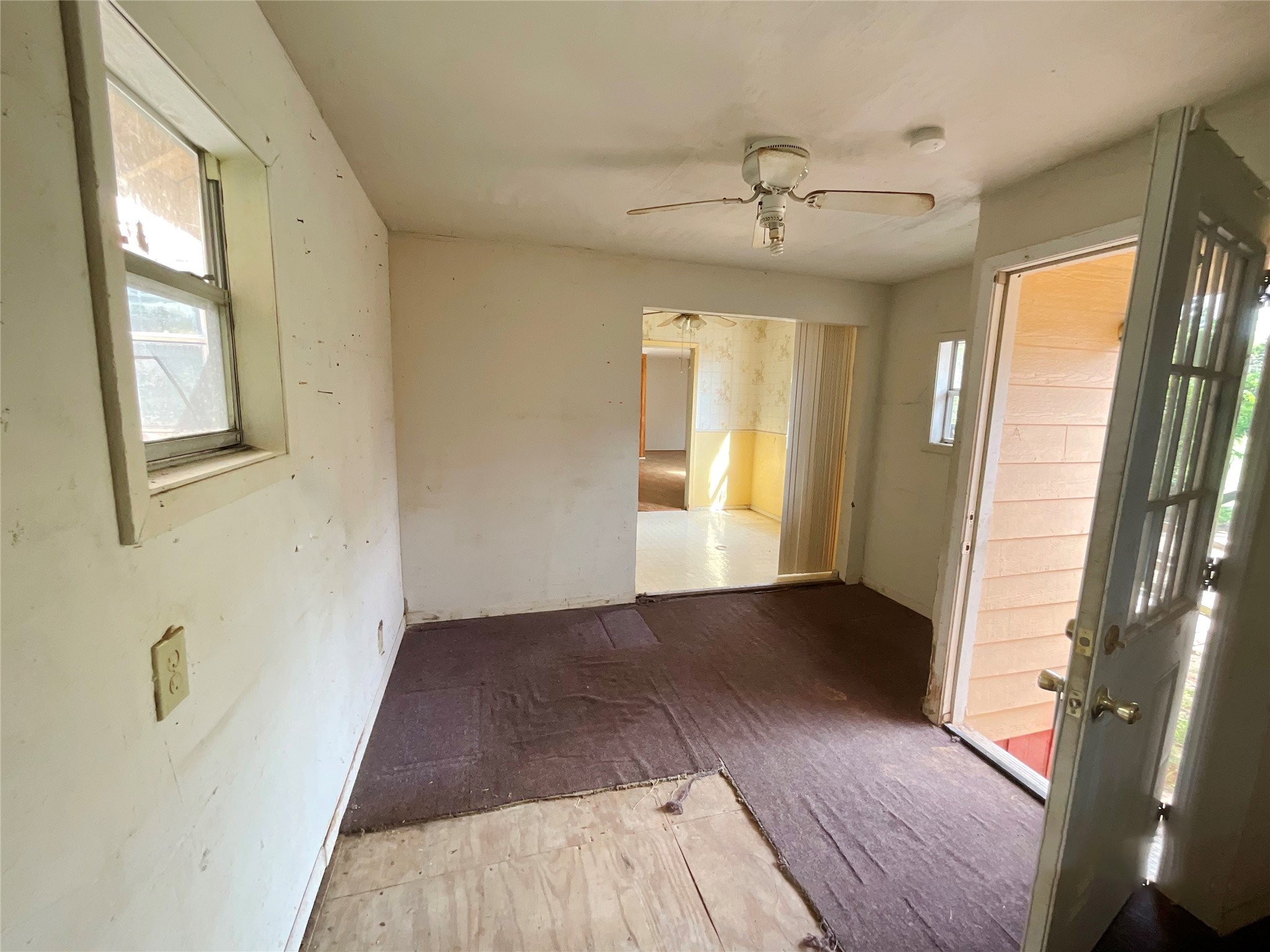 1571 FM 640 Road Wharton, TX 77488 - Photo 9 of 15 wooden floor in an empty room with a window