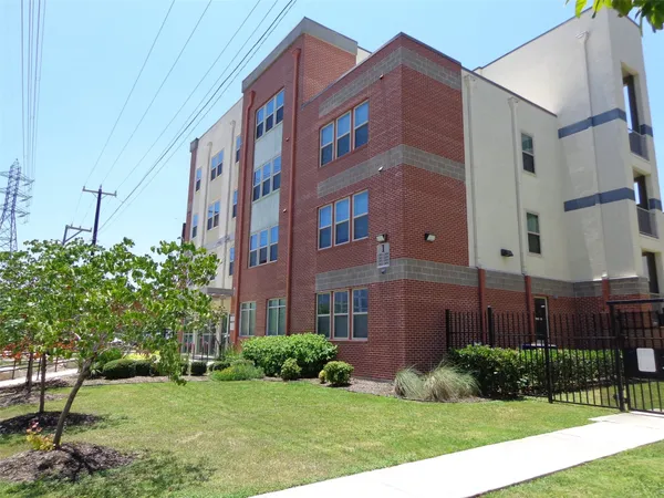 a view of a building with garden