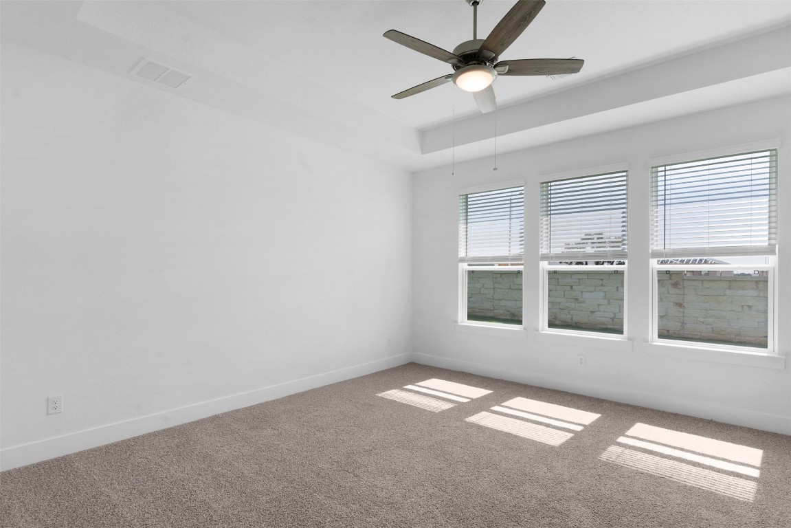 1129 Pansy Trail Georgetown, TX 78628 - Photo 14 of 28 an empty room with a empty space and windows
