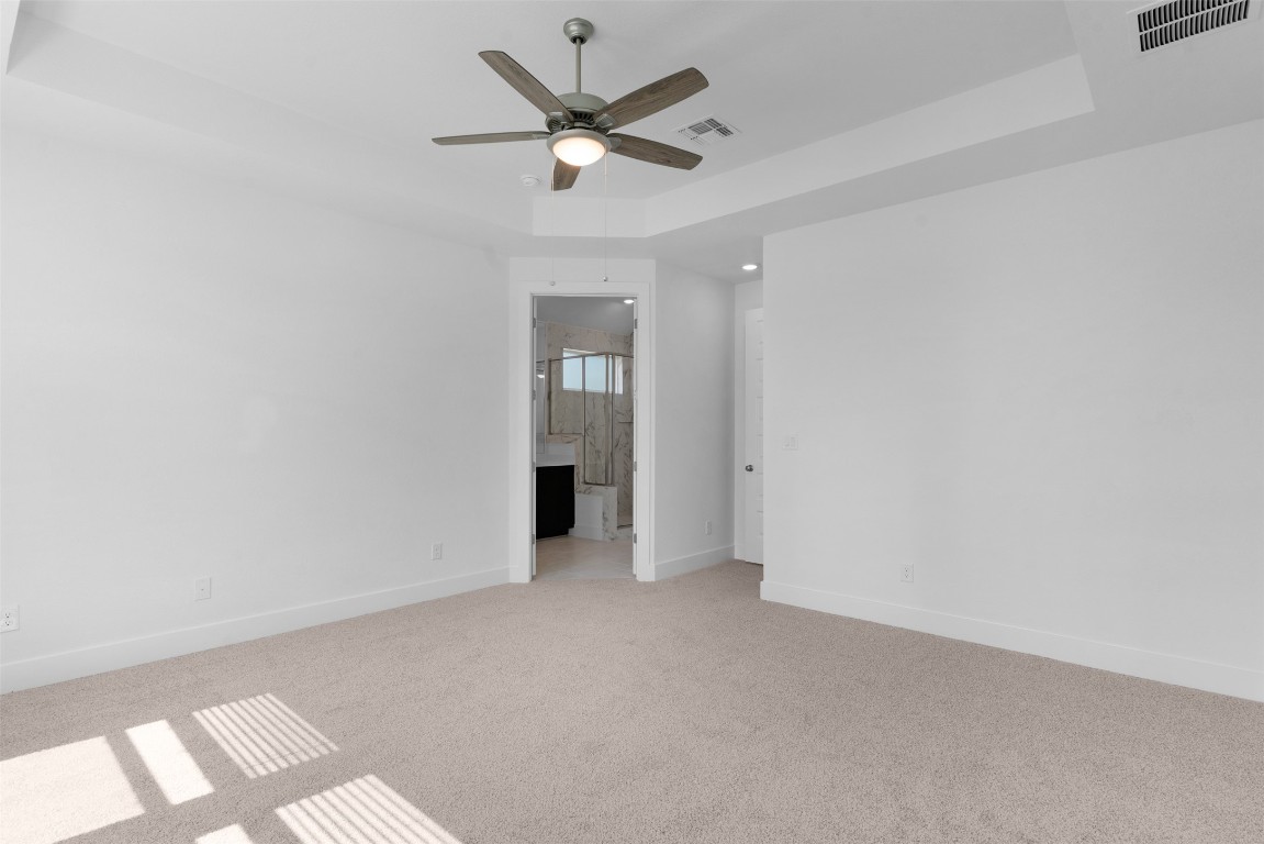 1129 Pansy Trail Georgetown, TX 78628 - Photo 15 of 28 an empty room with closet and a ceiling fan
