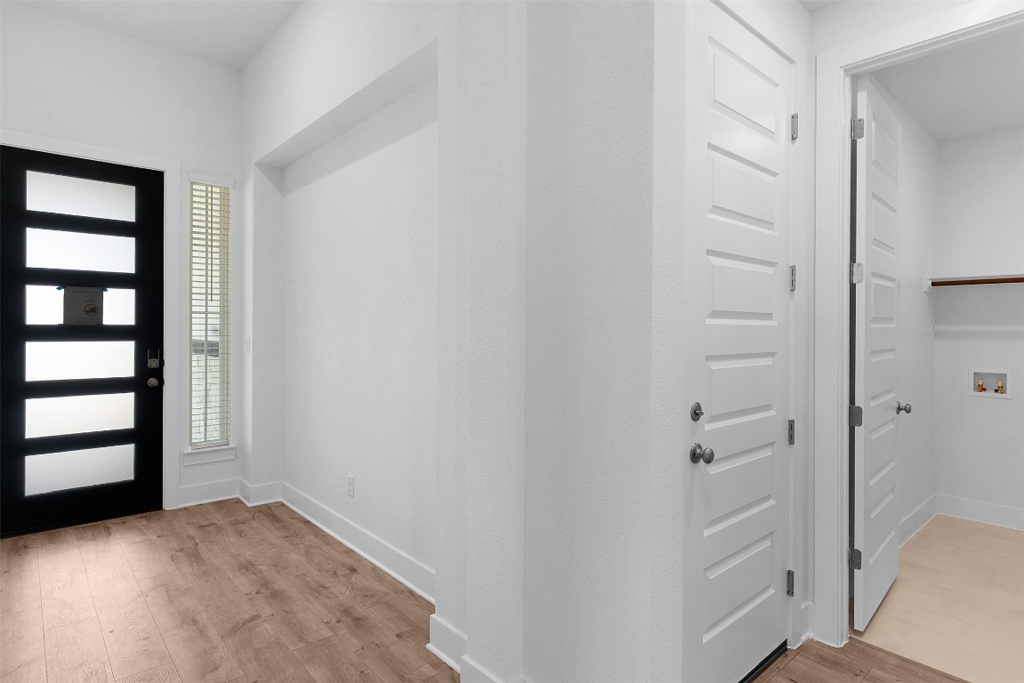 1129 Pansy Trail Georgetown, TX 78628 - Photo 2 of 28 a view of empty room with wooden floor