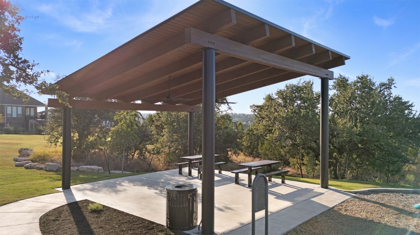 1129 Pansy Trail Georgetown, TX 78628 - Photo 27 of 28 a patio with table and chairs and potted plants