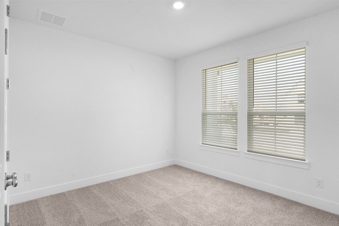 1129 Pansy Trail Georgetown, TX 78628 - Photo 3 of 28 an empty room with a window