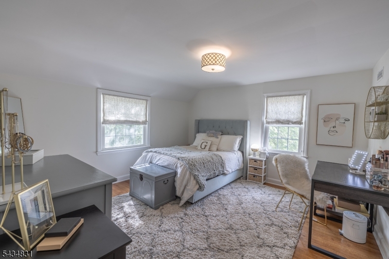 200 Wychwood Road Westfield, NJ 07090 - Photo 22 of 31 a bedroom with a bed window and couch