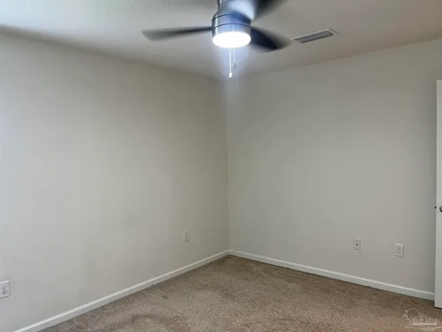 en empty room with a window