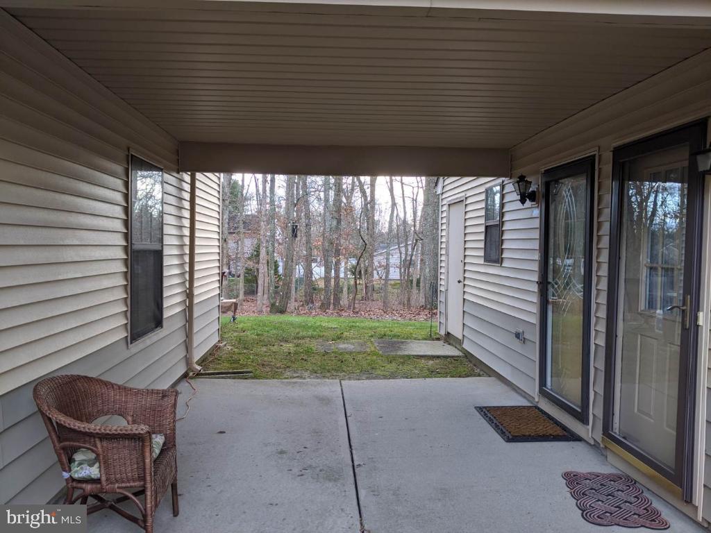 a house view with a backyard space