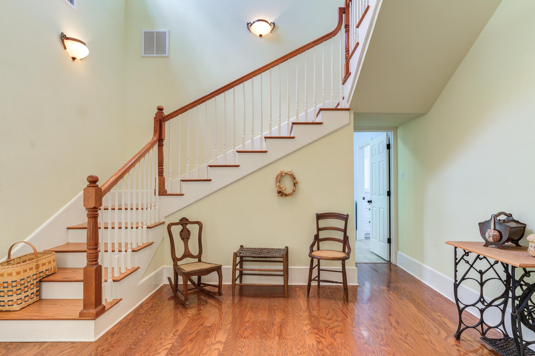 4709 116th Street Lubbock, TX 79424 - Photo 12 of 58 a view of entryway with wooden floor and dining room