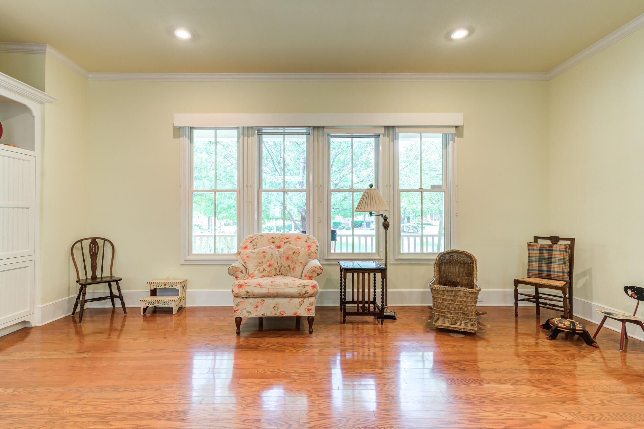4709 116th Street Lubbock, TX 79424 - Photo 14 of 58 a living room with furniture and floor to ceiling windows