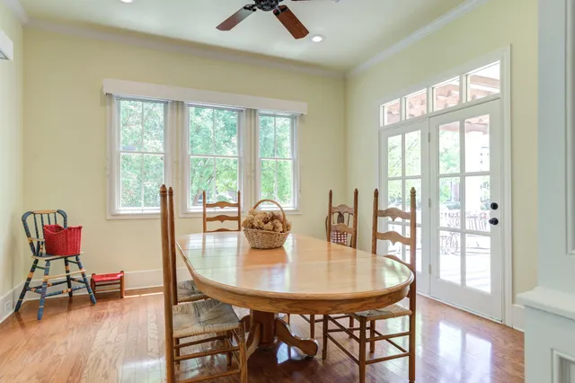a kitchen with stainless steel appliances granite countertop a sink and wooden cabinets
