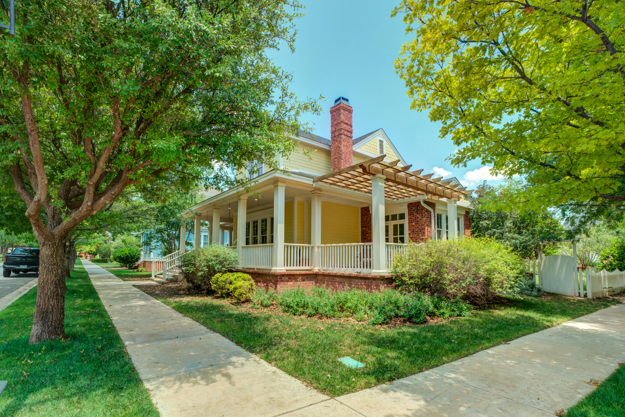 4709 116th Street Lubbock, TX 79424 - Photo 4 of 58 a front view of a house with garden