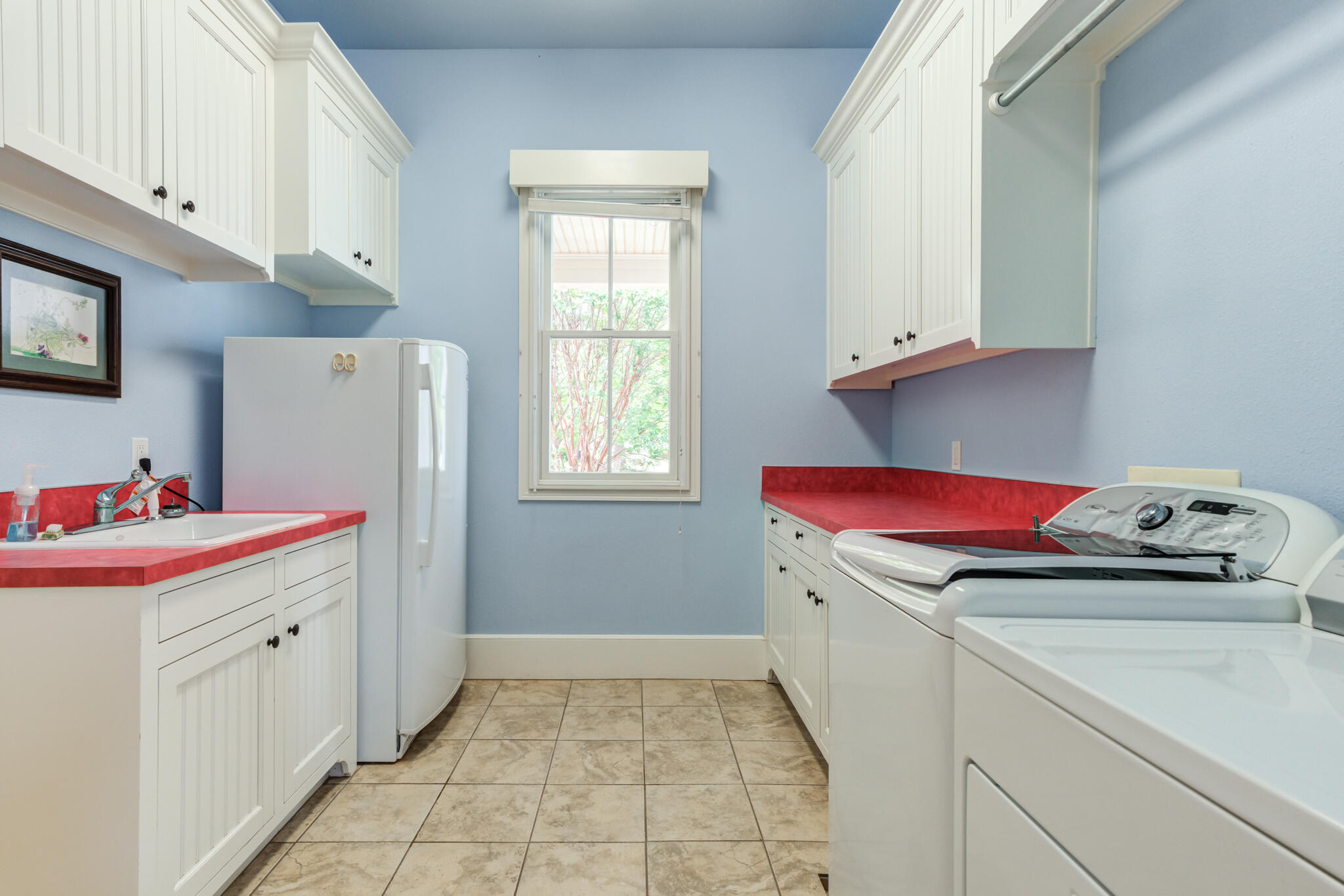4709 116th Street Lubbock, TX 79424 - Photo 42 of 58 a utility room with dryer and washer