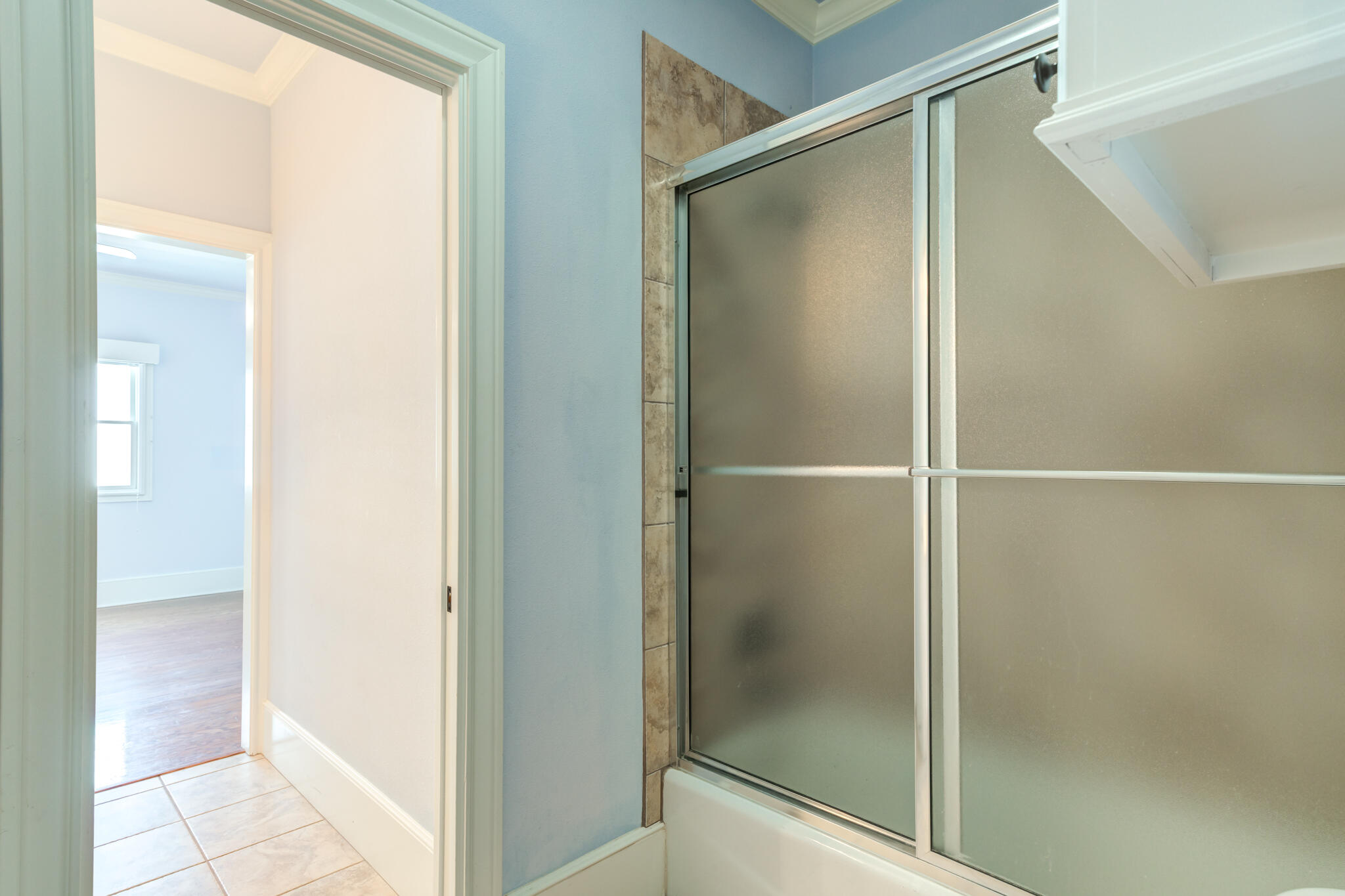 4709 116th Street Lubbock, TX 79424 - Photo 50 of 58 a bathroom with a glass shower