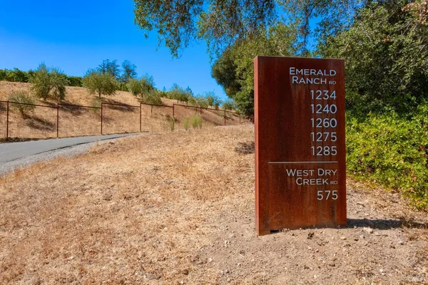 a sign on the side of the road