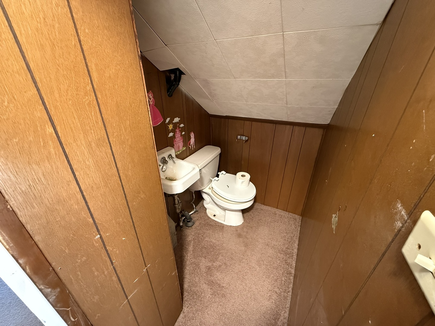 1104 Hemlock Avenue Dixon, IL 61021 - Photo 19 of 19 a bathroom with a sink and a toilet