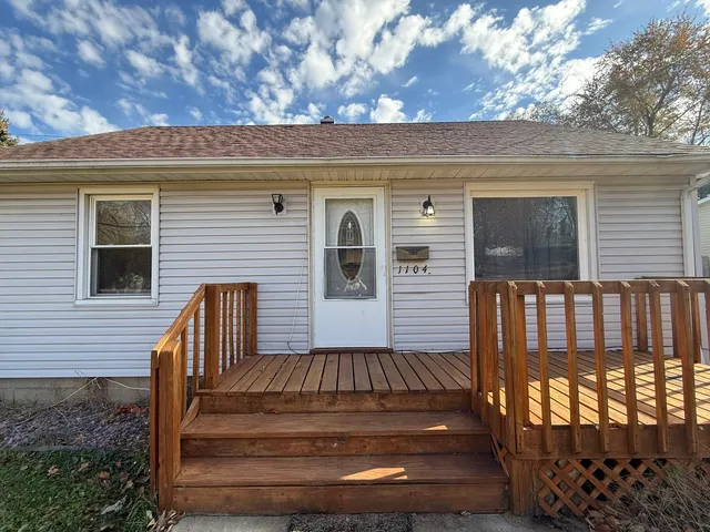 a view of outdoor space with deck and furniture