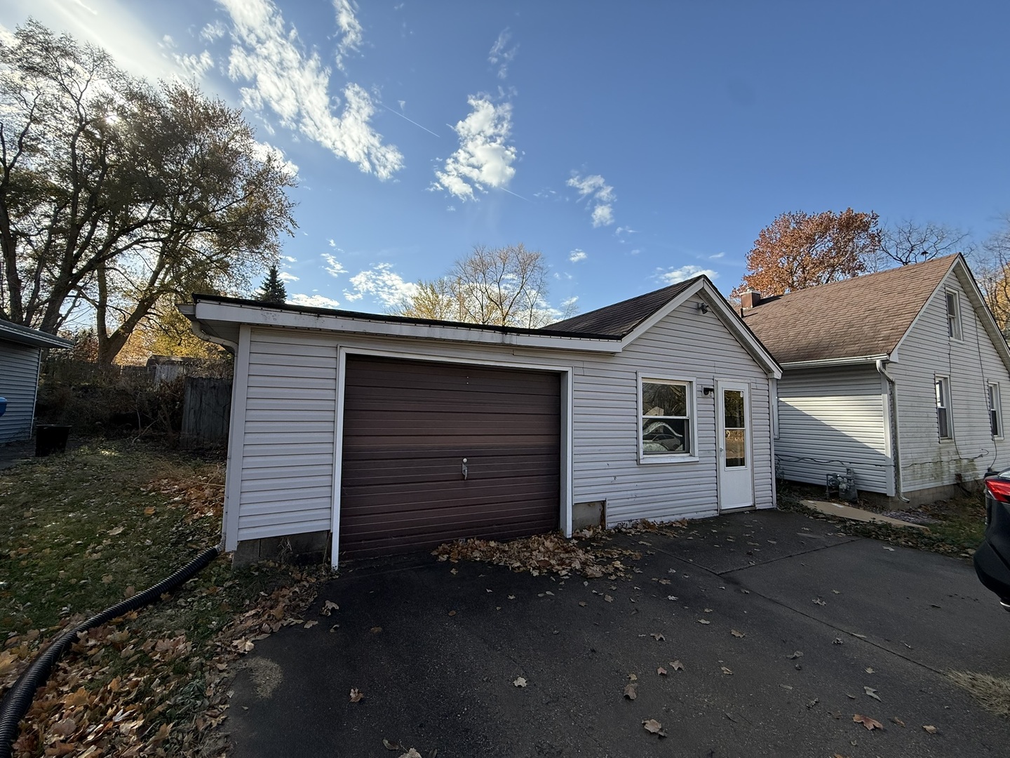 1104 Hemlock Avenue Dixon, IL 61021 - Photo 7 of 19 a front view of a house with a yard