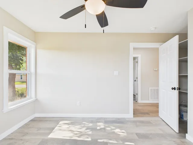 a view of entryway with wooden floor
