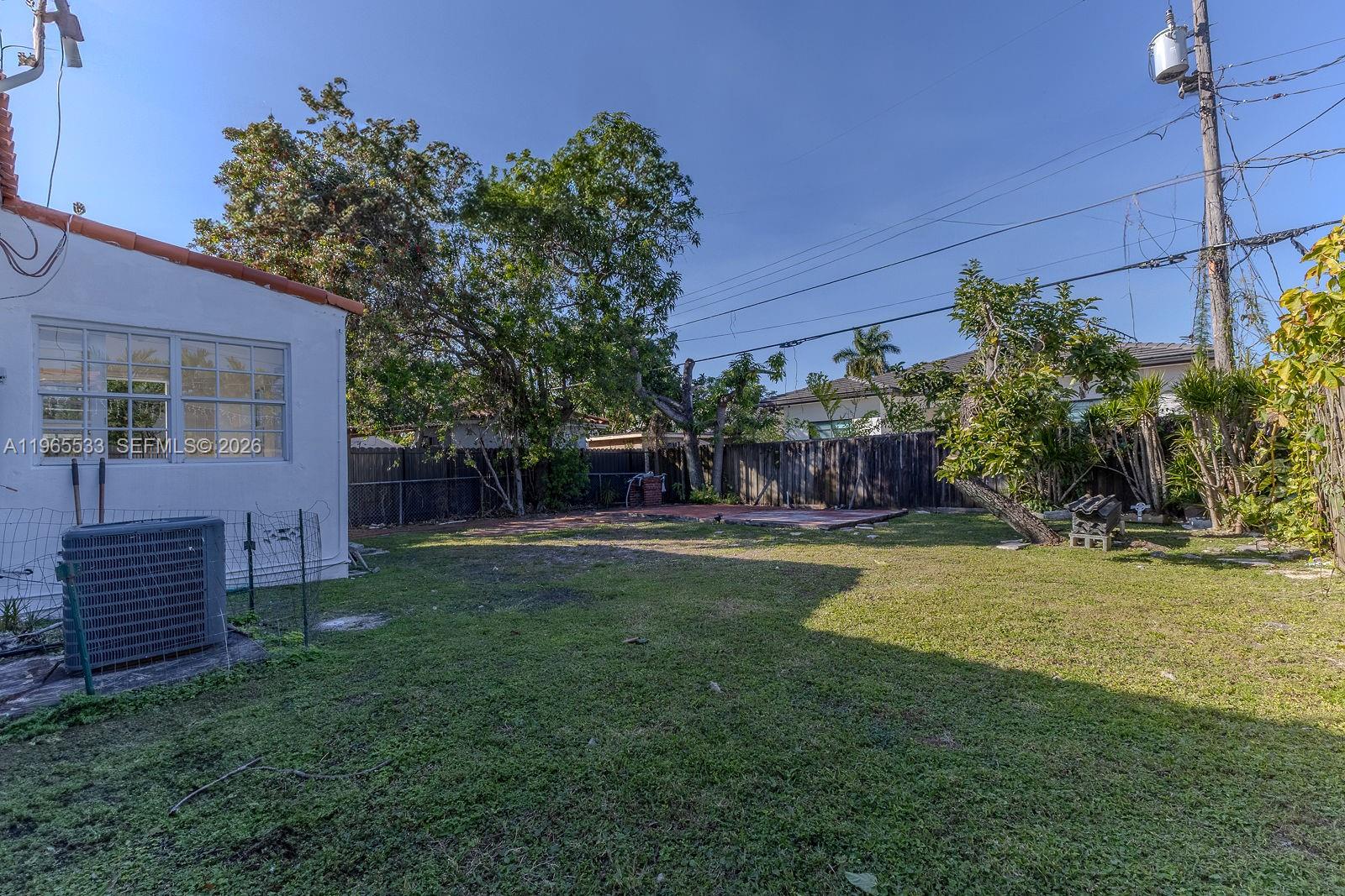 1441 Southwest 17th Street Miami, FL 33145 - Photo 25 of 26 a view of a house with a backyard