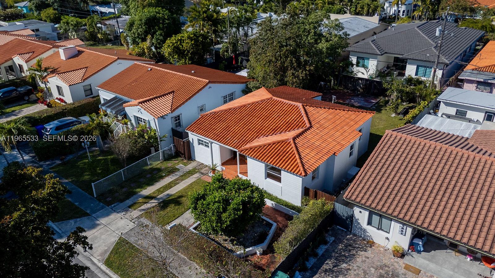 1441 Southwest 17th Street Miami, FL 33145 - Photo 8 of 26 an aerial view of a house with garden space and street view