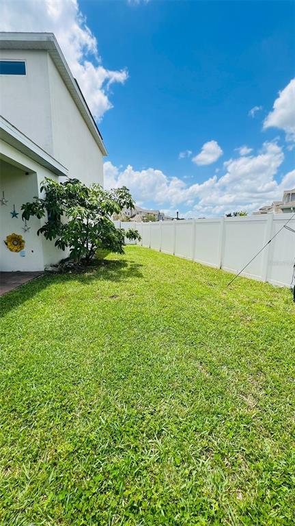 1257 Castlevecchio Loop Orlando, FL 32825 - Photo 4 of 12 a view of a garden