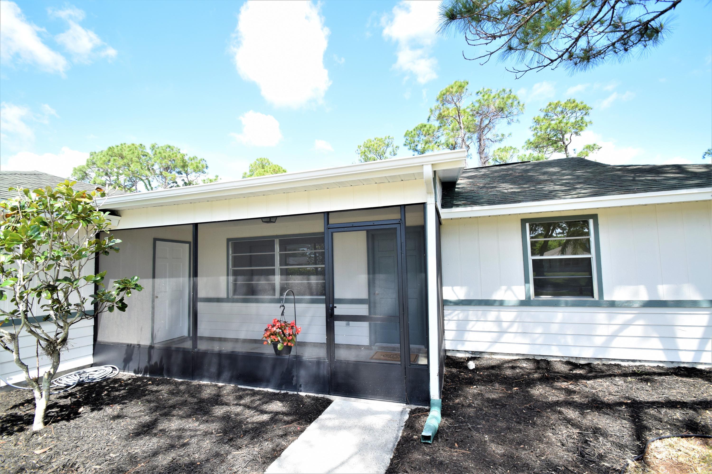 753 George Street Sebastian, FL 32958 - Photo 2 of 54 Front screened porch