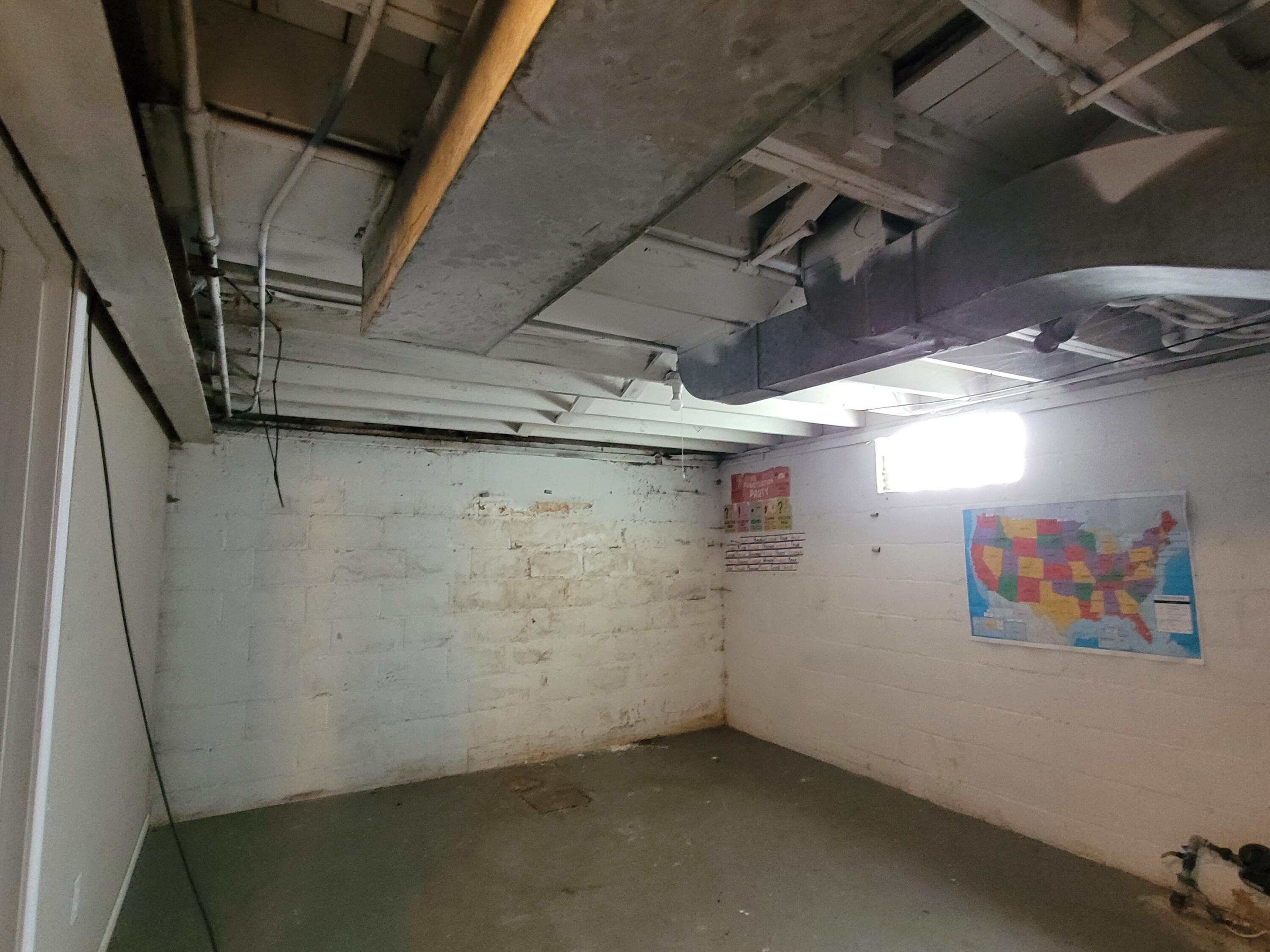 231 Taft Place Gary, IN 46404 - Photo 13 of 14 a view of a room with racks on the wall