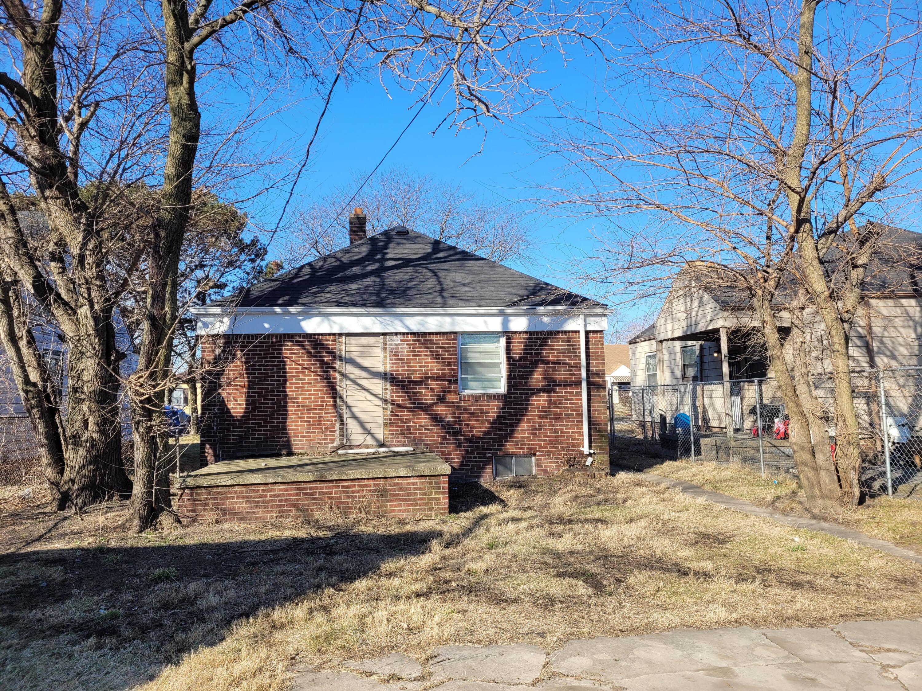231 Taft Place Gary, IN 46404 - Photo 2 of 14 a view of a backyard of a house