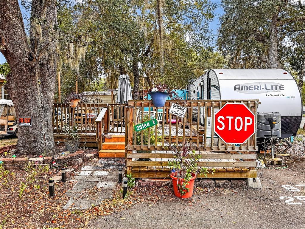 25184 Northeast 143rd Place Salt Springs, FL 32134 - Photo 2 of 42 a view of outdoor space with garden