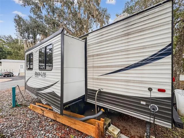 a view of a house with a street