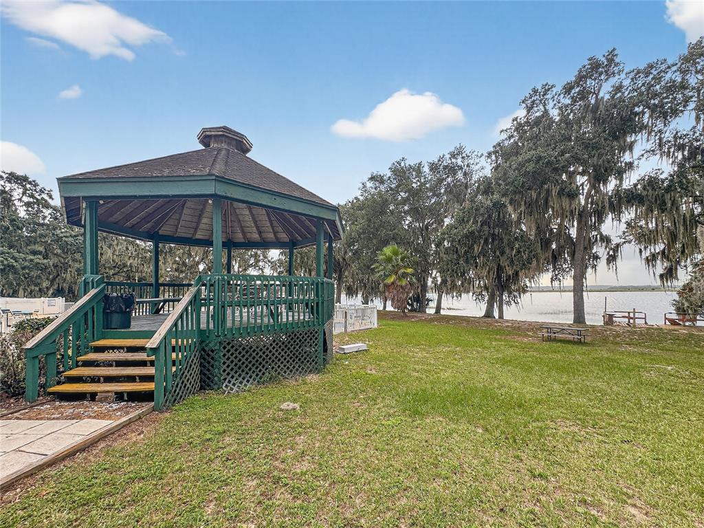 25184 Northeast 143rd Place Salt Springs, FL 32134 - Photo 35 of 42 a view of outdoor space with seating