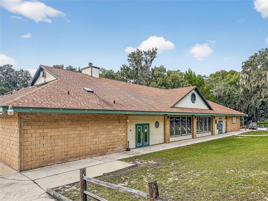 25184 Northeast 143rd Place Salt Springs, FL 32134 - Photo 37 of 42 a front view of a house with garden