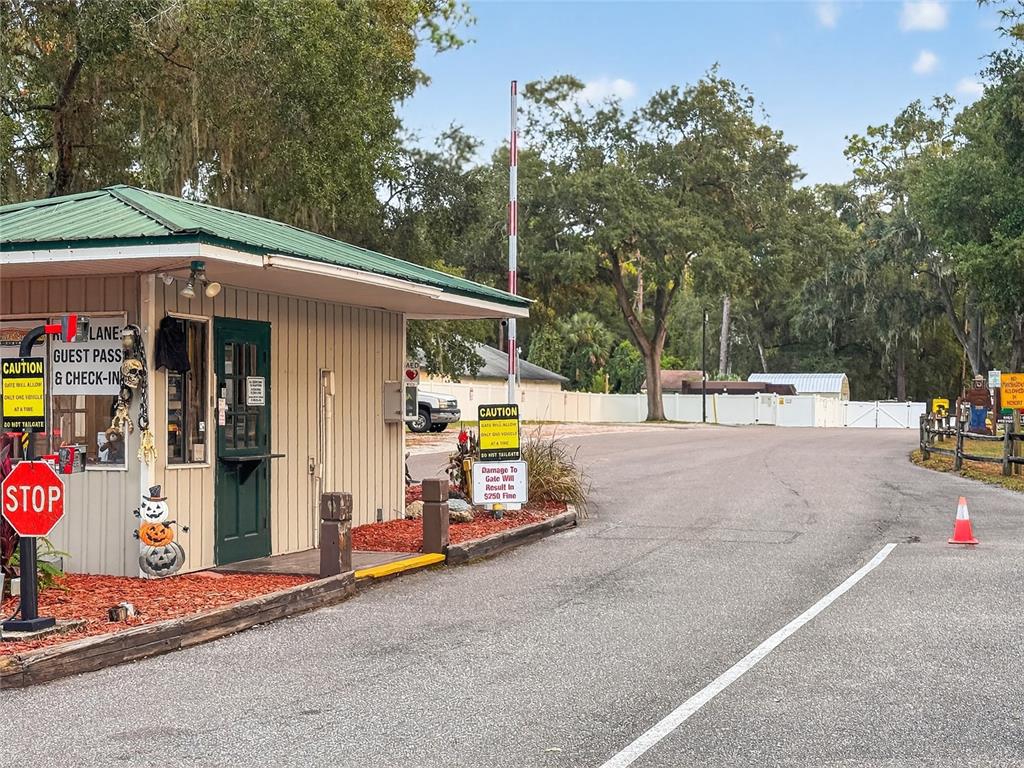 25184 Northeast 143rd Place Salt Springs, FL 32134 - Photo 41 of 42 a view of road with card and sign board